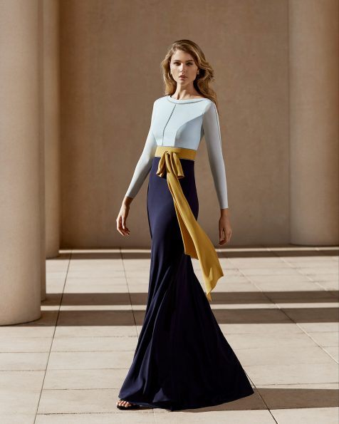 Stretch crepe Georgette cocktail dress. Bateau neckline with long sleeves and large bow at the waist. 2020 ROSA CLARA COCKTAIL Collection.