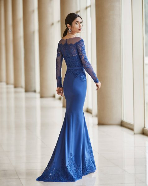 Cocktail dress in stretch crepe Georgette with lace and beading on the bodice. Illusion neckline with long sleeves and bow at the waist. 2020 ROSA CLARA COCKTAIL Collection.