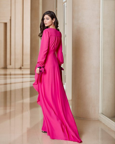 Cocktail dress in stretch crepe Georgette with lace neckline. V-neckline with bow and horizontal draping on the skirt. Long bishop sleeves. 2020 ROSA CLARA COCKTAIL Collection.