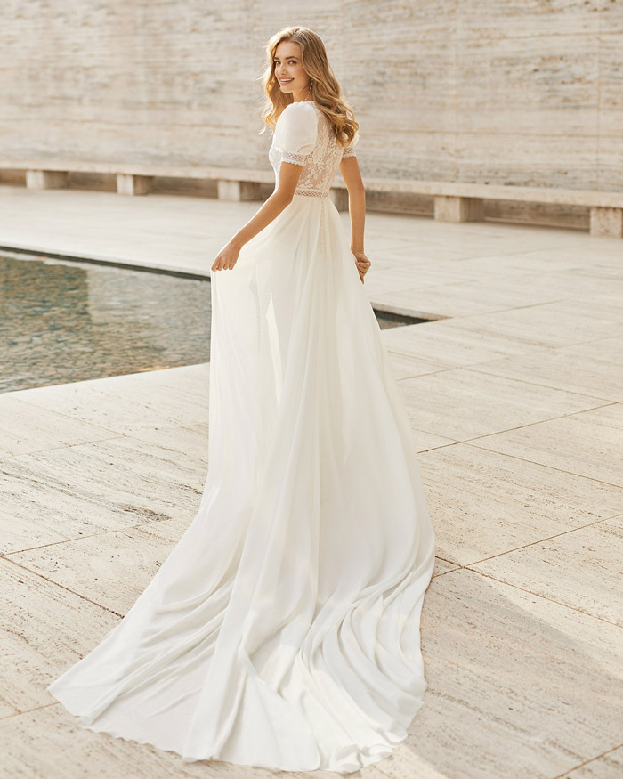 O artesanato dos vestidos de noiva de renda e chantilly