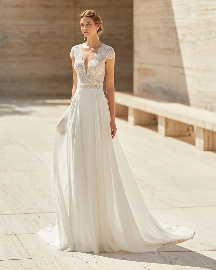 O artesanato dos vestidos de noiva de renda e chantilly